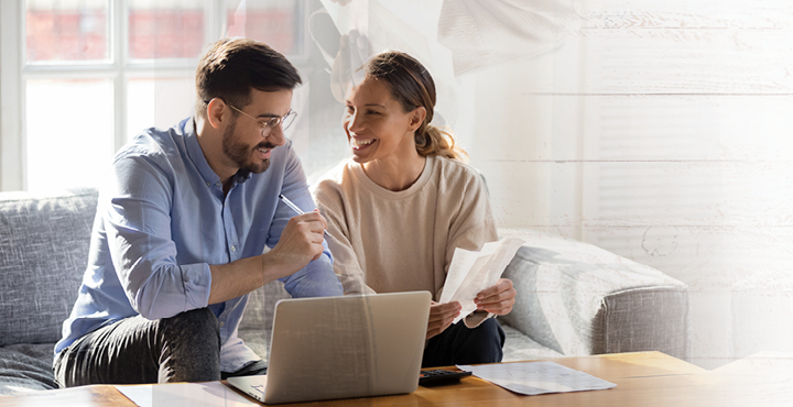 Couple using a laptop computer