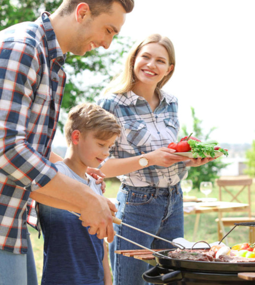 Family-Grilling-Outdoors